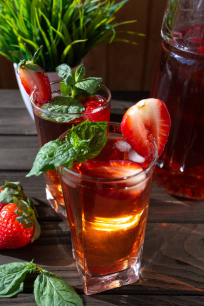 istock strawberry lemonade with mint on a wooden background 1387517069