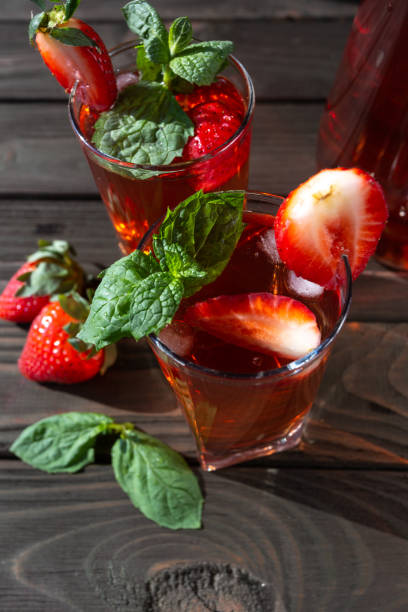 istock strawberry lemonade with mint on a wooden background 1387517071