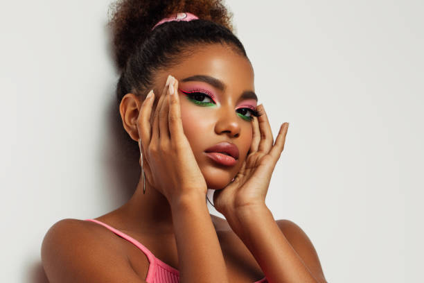 istock Beautiful afro woman with bright make-up 1387520540