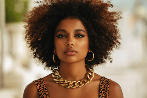 istock Pretty young afro woman 1387520781