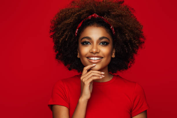istock Pretty young afro woman 1387521467