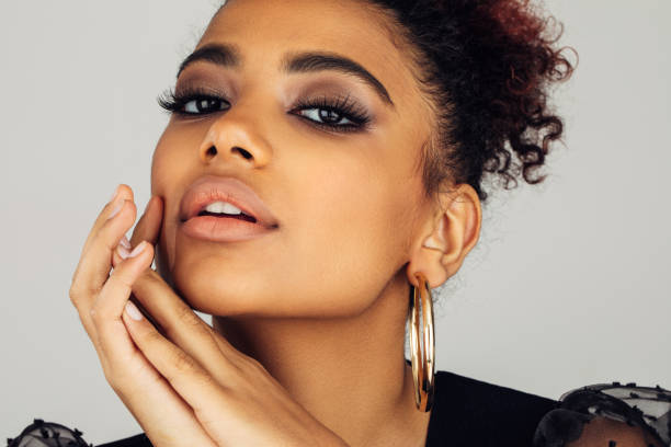 istock Beautiful afro woman with perfect make-up 1387521984