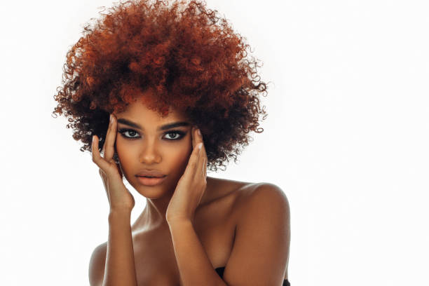 istock Beautiful afro woman with perfect make-up 1387521995