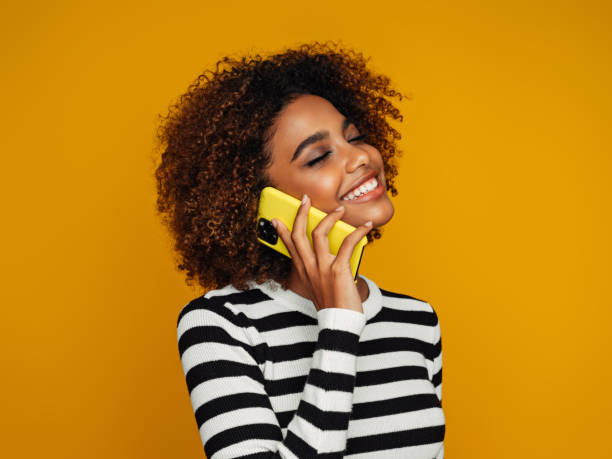 istock Beautiful afro woman 1387523755