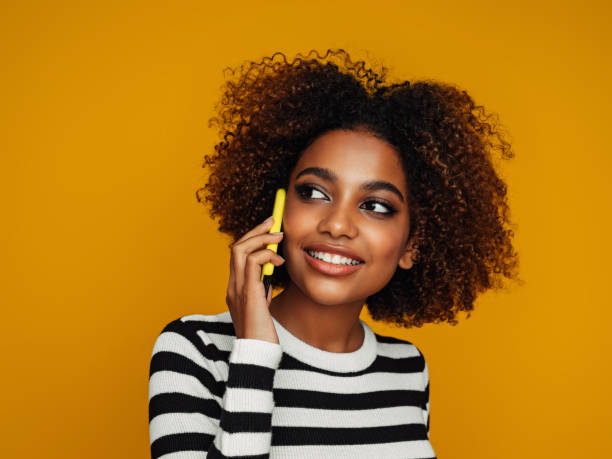 istock Beautiful afro woman 1387523788