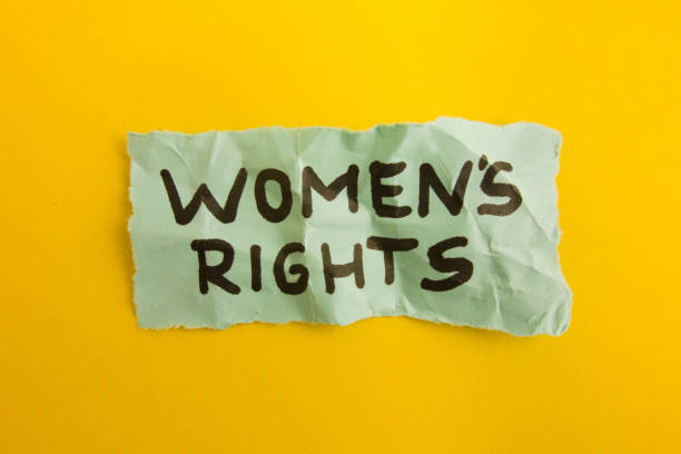 istock Words women's rights handwritten on crumpled note 1387525118