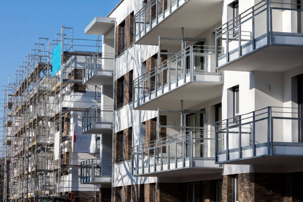 istock Apartment Building with Balconies under Construction 1387527691