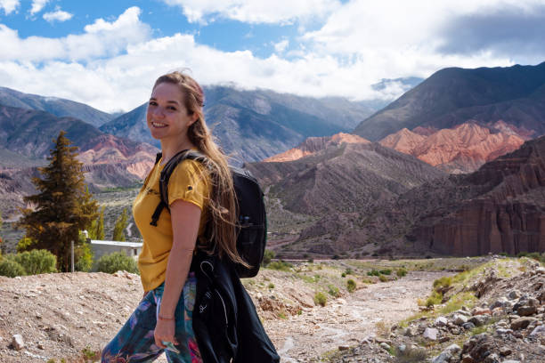 Young woman posing in Jujuy, Argentina. Young woman posing in Jujuy, Argentina. Woman doing mountain trekking. Woman walking in the mountains. Landscapes of Argentina argentinian ethnicity stock pictures, royalty-free photos & images