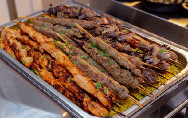 istock Traditional Arabic Kebab, kofta,Shish taouk, lamb brochette served with rice. 1387538610