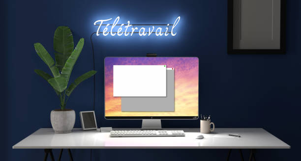 istock laptop on a desk - pink color - mock up 1387538944