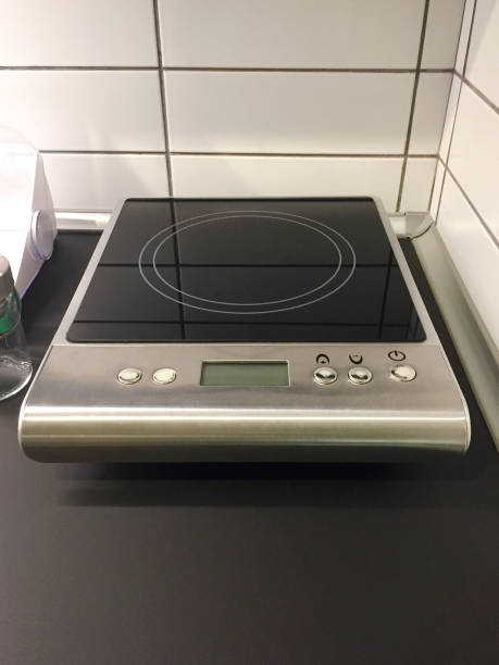 istock Small electric cooker stove on the kitchen counter 1387541460