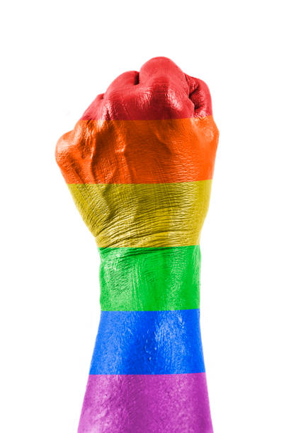 istock Colourful Hand fist raising 1387541472