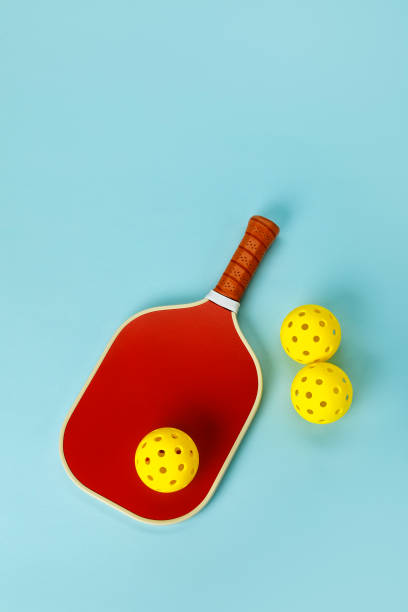 istock Pickleball Paddle and Balls 1387546041