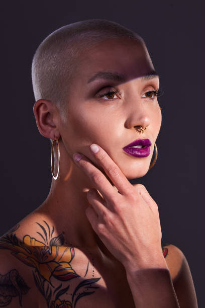 istock Studio shot of a beautiful young woman 1387546190
