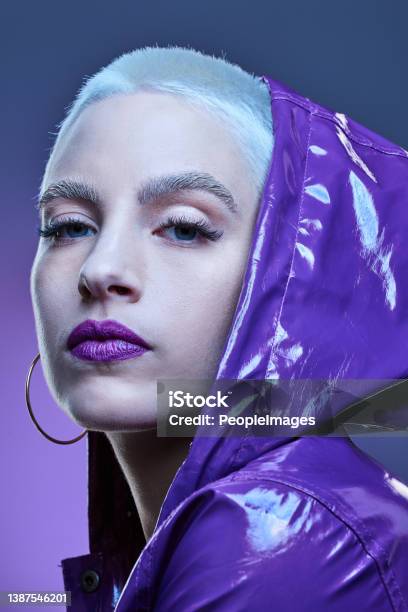 Studio Shot Of A Beautiful Woman Woman Wearing A Purple Jacket And Purple Lipstick Stock Photo - Download Image Now