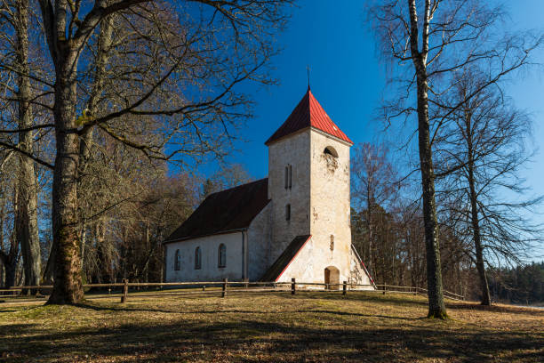 istock Ivande lutheran church in sunny spring day, Latvia. 1387549581