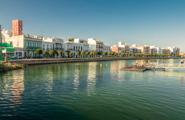 Traditional architecture houses from the region along the bank of the Estero de la Rivera in Ayamonte, Andalusia, Spain. stock photo