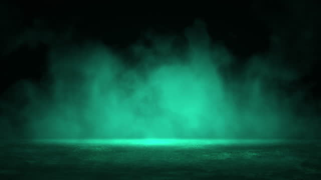 Smoke flying over the asphalt is illuminated with neon light. Animation loop stock video.