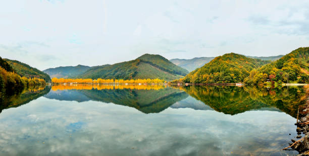 autumn reflection panorama of reservoirs Autumn reflection of the reservoirpanorama VD702 korea autumn stock pictures, royalty-free photos & images