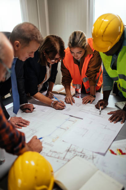 istock Finishing up the plans 1387565651
