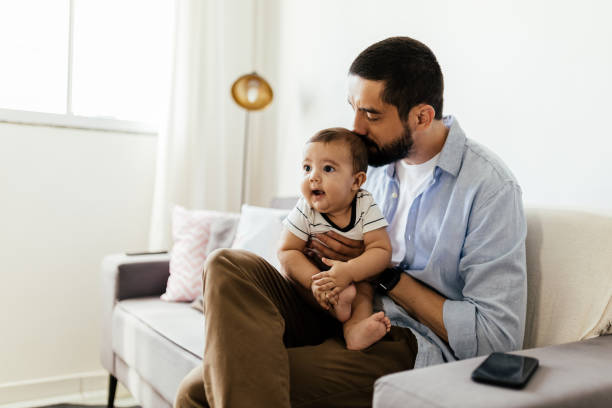 father and his baby son playing at home - father fathers day baby child imagens e fotografias de stock