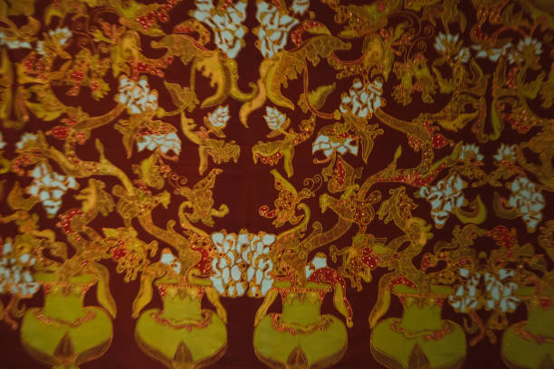 istock Yogyakarta Batik flower image with brown background 1387576748
