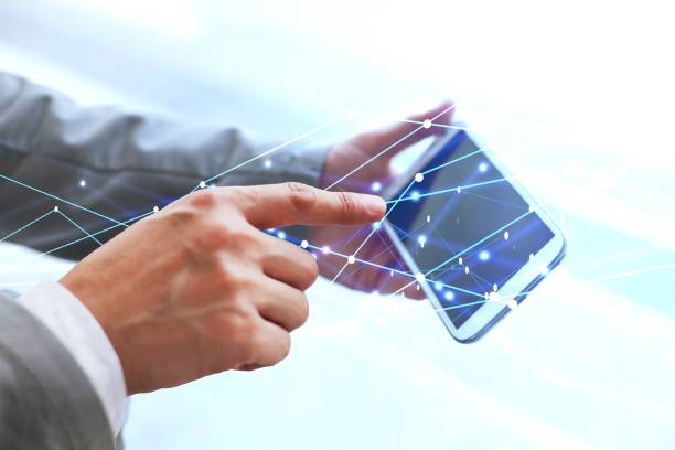 istock Business man hand connection technologies with smartphone. 1387578458