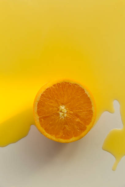 istock Creative photography, spilled orange juice 1387584189