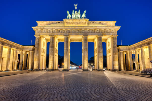 istock The illuminated Brandenburg Gate at twilight 1387590853