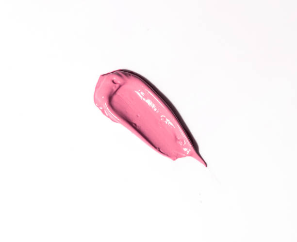 istock Pink matte lipstick, smear texture on a white background 1387593944