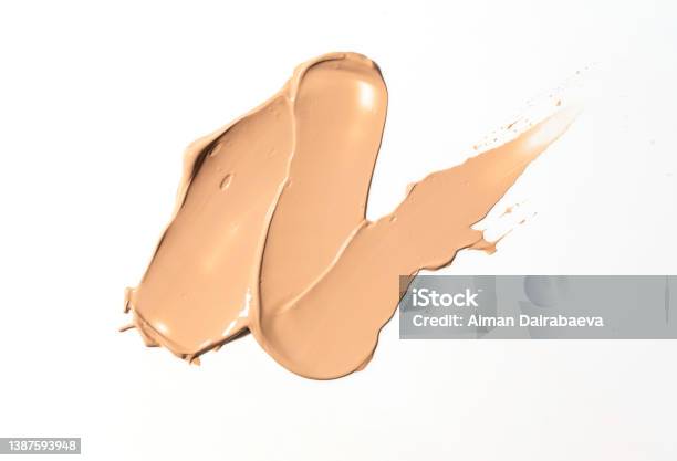 Creamy Foundation Smeared On White Background Isolated Beauty And Fashion Conception Stock Photo - Download Image Now