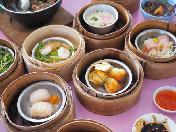 istock Dim sum Chinese steamer food in bamboo dish 1387600304
