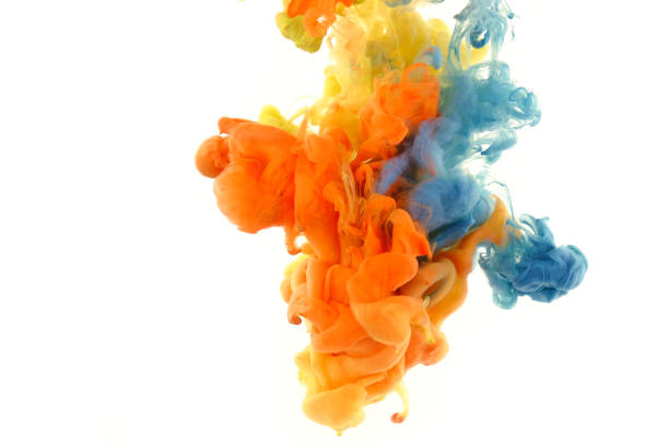 photo of paint falling into the water