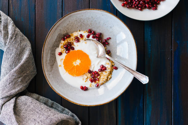 istock Oatmeal with yogurt and pomegranate 1387613311