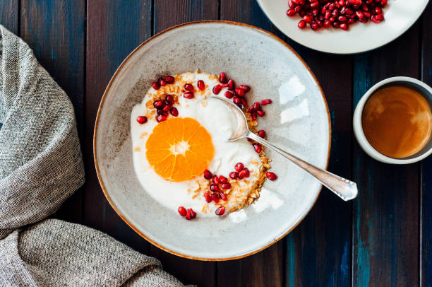 istock Oatmeal with yogurt and pomegranate 1387613323