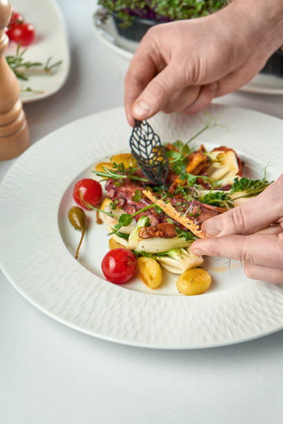 istock Grilled octopus sprinkled with fresh spices 1387614165