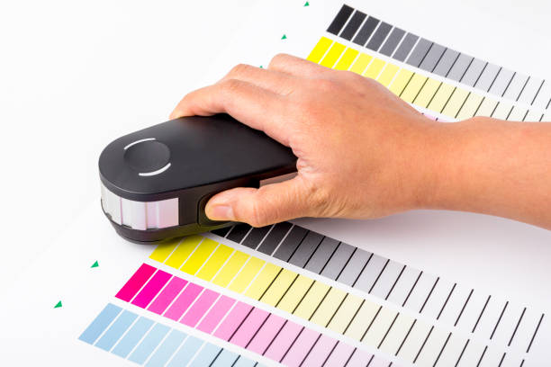 Swatches of different colors in color palette magnifier and graphics tablet. Interior designer