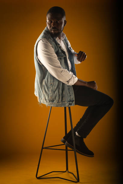 istock Posing and sitting on the high chair 1387615465