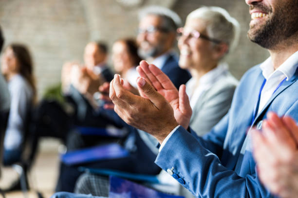 istock Close up of applauding on education event. 1387616969