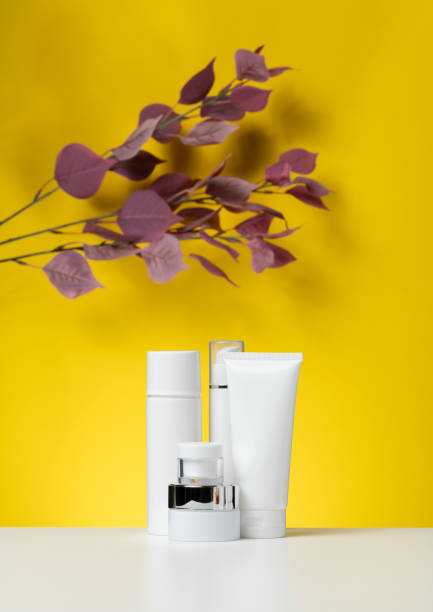 istock empty white plastic tubes and jars for cosmetics. Packaging for cream, gel, serum, advertising and product promotion 1387617668