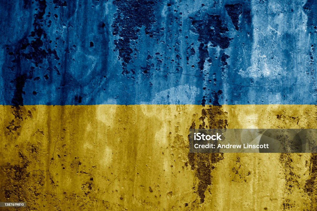 Wall texture with flag of Ukraine Flag of the Ukraine on a rough textured wall background Ukraine Stock Photo