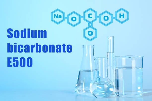 istock Text Sodium bicarbonate E500 with soda formula and laboratory glassware on background 1387620516