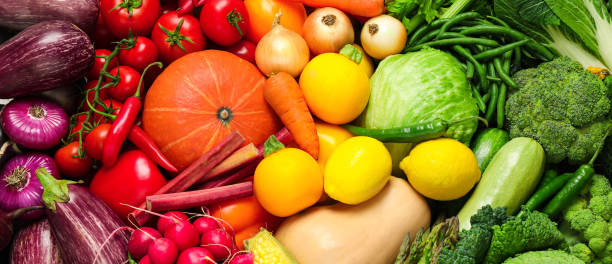 istock Many fresh different vegetables as background, top view. Banner design 1387620578