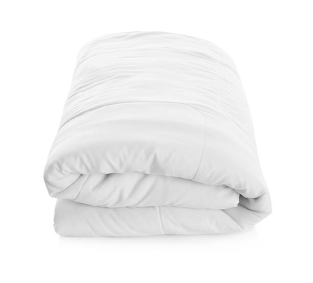 istock Folded clean blanket isolated on white. Household textile 1387620650