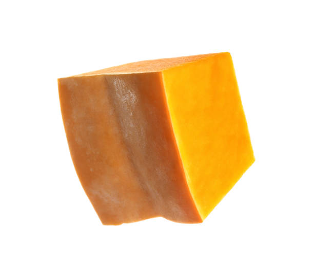 istock Piece of ripe orange pumpkin isolated on white 1387620701