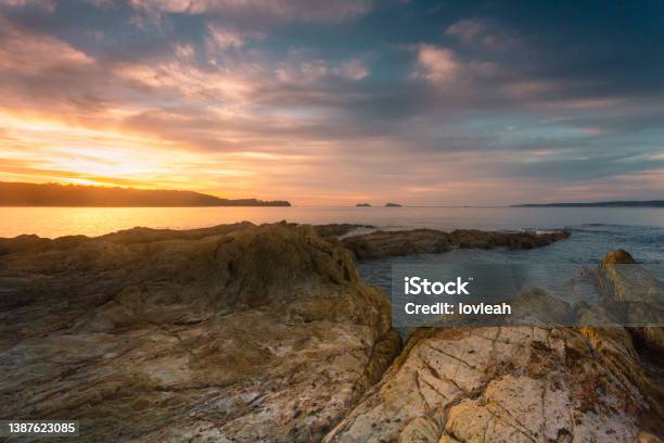 Golden Sunrise Over The Coastal Bay Stock Photo - Download Image Now - Australia, Beach, Beauty