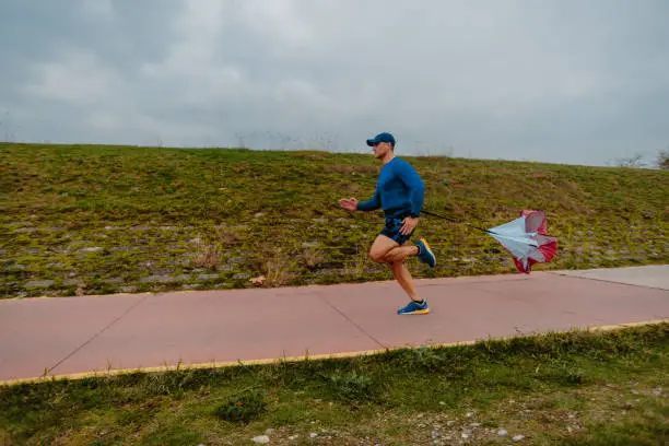 Photo of Running with speed resistance. Workout outdoors