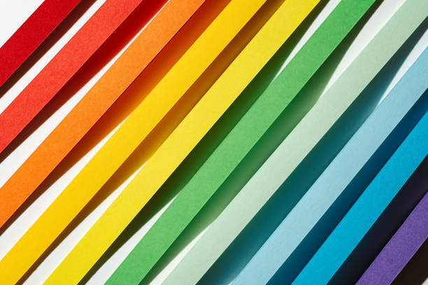 Rainbow colored paper stripe waves Rainbow colored paper stripes for quilling diagonal. Minimalistic pride flag of freedom and tolerance paper quilling stock pictures, royalty-free photos & images
