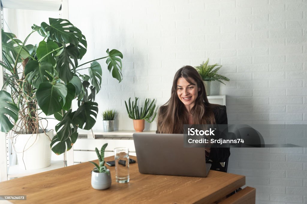 Young business woman psychotherapist doctor having online psychotherapy therapy with her patient on video call on the laptop computer while she working at home in the home office, telemedicine concept Mental Health Professional Stock Photo Young business woman psychotherapist doctor having online psychotherapy therapy with her patient on video call on the laptop computer while she working at home in the home office, telemedicine concept Mental Health Professional Stock Photo