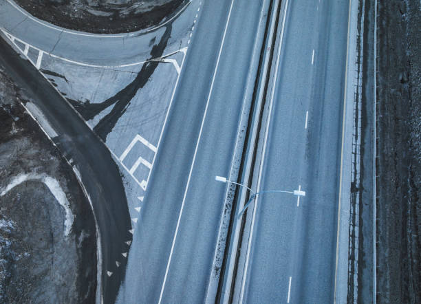 istock Road junction. Aerial view. Empty road in evening time 1387626453